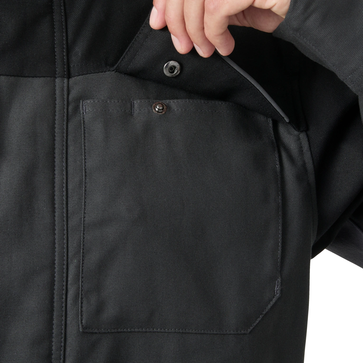 Close-up of Helly Hansen Oxford black jacket chest storage pocket