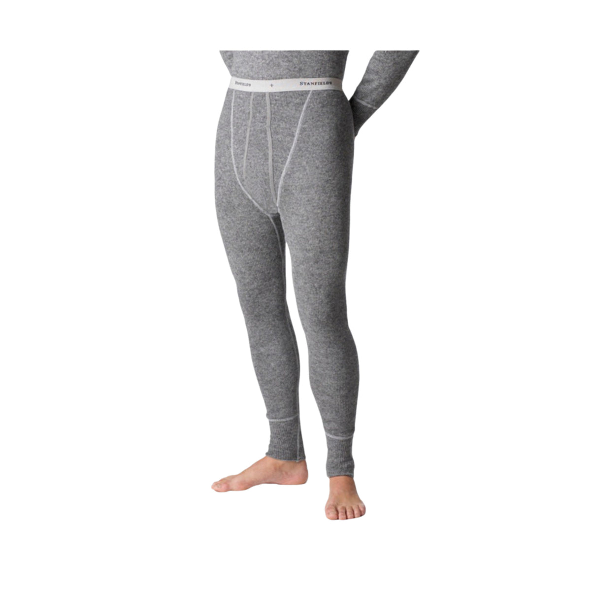 Stanfield's 1312 heavy weight wool long johns in grey, worn by a model, front view of the legs