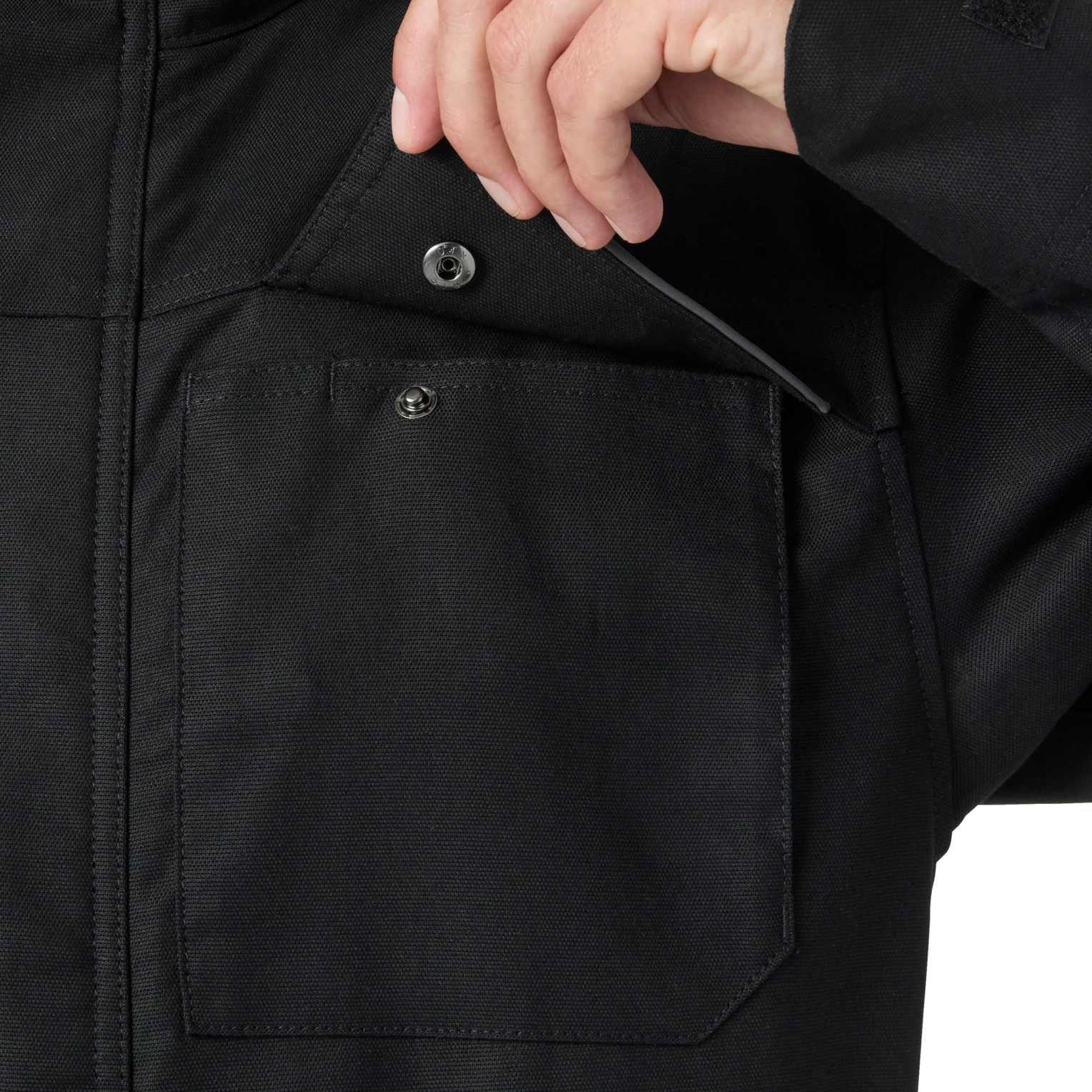 Close-up of Helly Hansen Oxford black work jacket chest pocket
