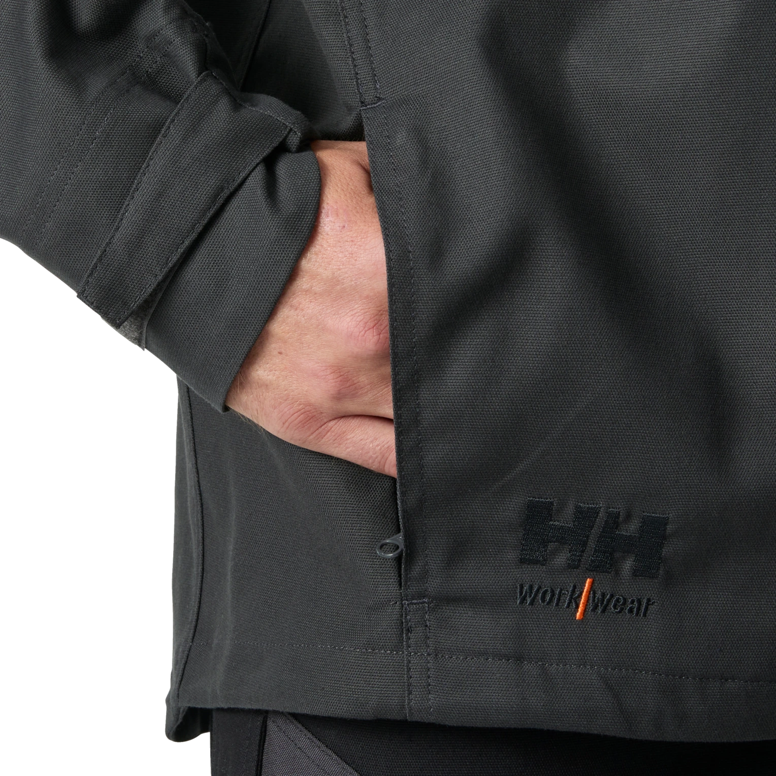Hand using Helly Hansen Oxford black work jacket side pocket