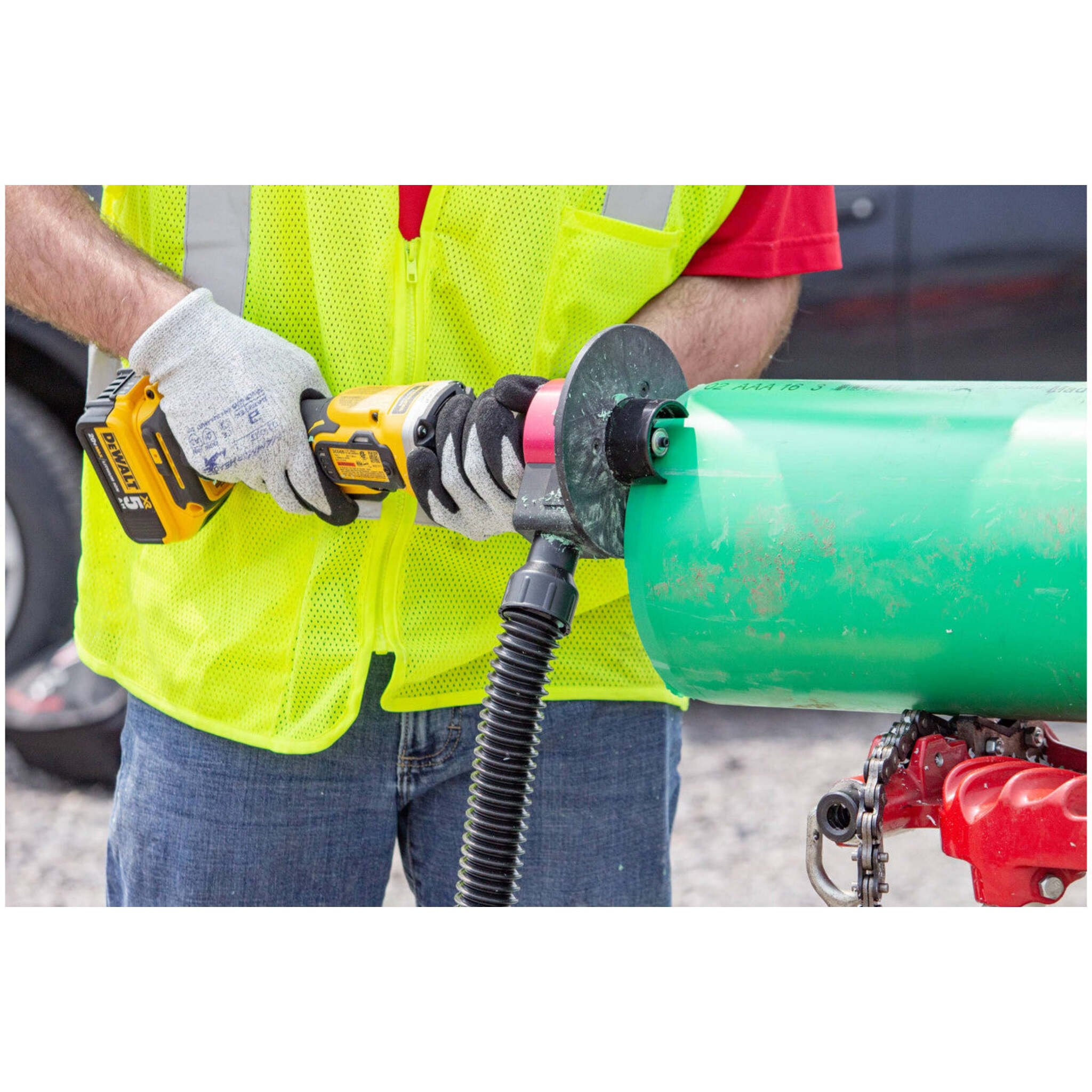 REED Bevel Boss vacuum adapter removing debris during plastic pipe beveling